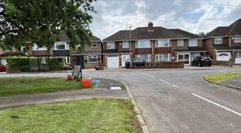 The Upham Road junction with South View Avenue with semi-detached houses in the background.