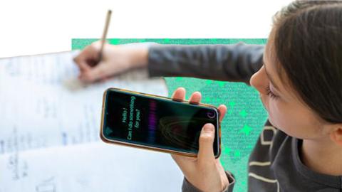 Girl writes on paper while holding a mobile phone in her other hand