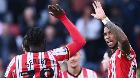 Femi Seriki and Tyrese Campbell celebrate