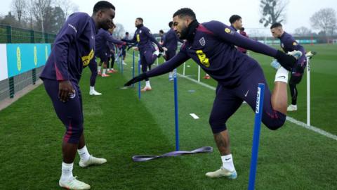 Marc Guehi (left) trains with Reece James