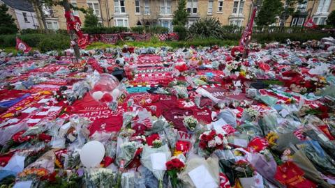 Tributes to Liverpool and Portugal forward Diogo Jota outside Anfield