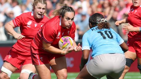 Wales player runs with ball