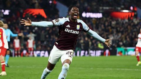 Jamaldeen Jimoh-Aloba celebrates scoring.