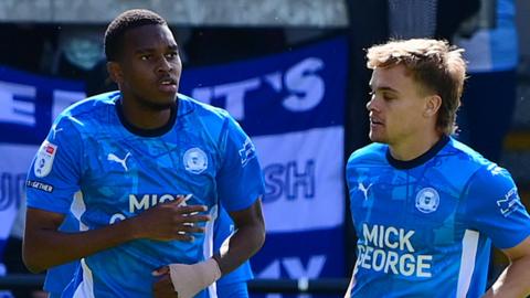 Peterborough celebrate scoring 