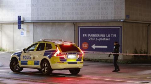 Police work at the scene in a parking garage where the Swedish rapper C. Gambino was shot dead in Gothenburg, Sweden on June 5, 2024