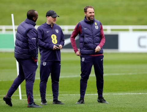 England manager Gareth Southgate with assistant coaches Jimmy Floyd Hasselbaink and Steve Holland during training 