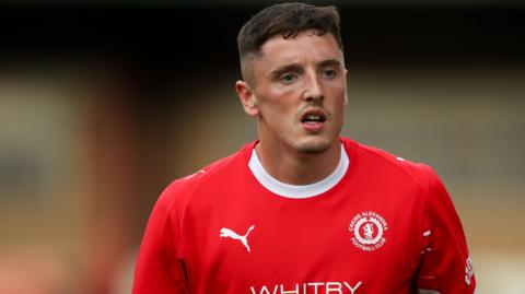 Reece Hutchinson in action for Crewe