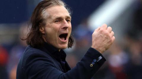 Gareth Ainsworth celebrates Shrewsbury's win over Birmingham City in his first game in charge