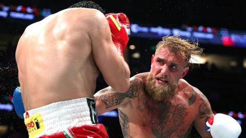 Jake Paul lands a body shot against Julio Cesar Chavez Jr