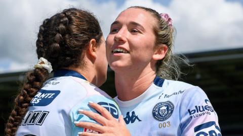 Wigan's Georgia Wilson hugs a team-mate after her side's victory over York.