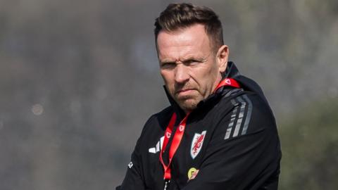 Craig Bellamy watches training