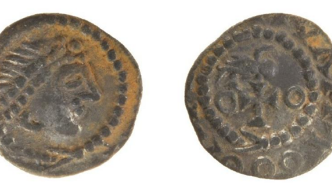 Two examples of the coins, which have prominent markings on them.