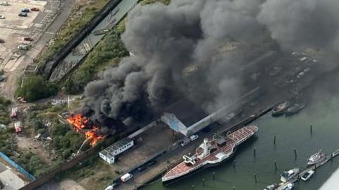 An aerial shot of a large building fire.