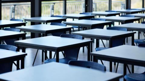 Big empty classroom at modern school - stock photo