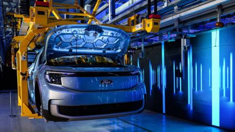 A electric Ford Explorer is seen on an electric car production line at the Ford automobile factory