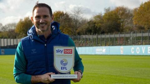 Coventry head coach Frank Lampard poses with the EFL Championship Manager of the Month award