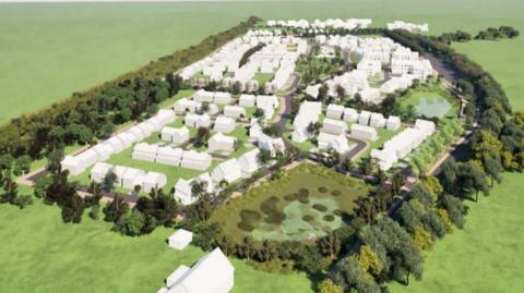 A computer-generated aerial view showing how the 500 homes near Bragbury End could look. The homes are surrounded by trees and greenery.
