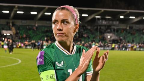 Denise O'Sullivan applauds the home fans at Tallaght Stadium after the 3-0 victory