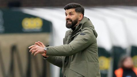 Miron Muslic watches Plymouth's game against QPR from the touchline 