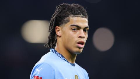 Jahmai Simpson-Pusey in action for Manchester City