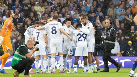 Leeds United players in a huddle