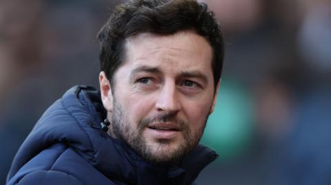 Ryan Mason in his West Bromwich Albion club puffer coat