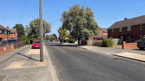 Hemswell Avenue in Lincoln. It is a long residential street with houses either side.