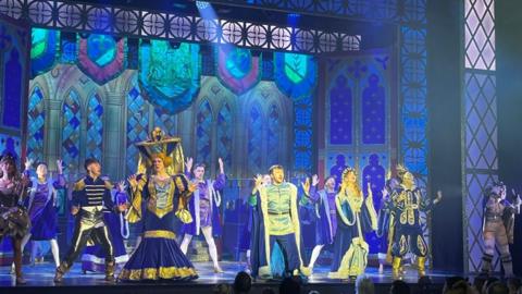 Panto performers on stage