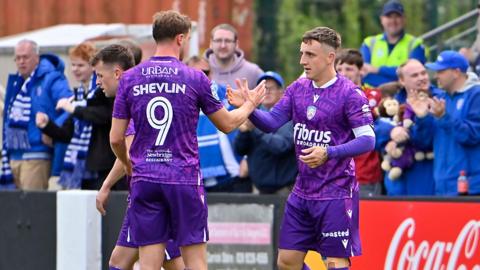 Joel Cooper celebrates