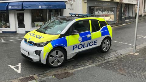 Guernsey Police car parked on a road