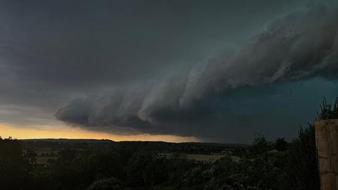 A storm in dark skies rolling in over Glastonbury