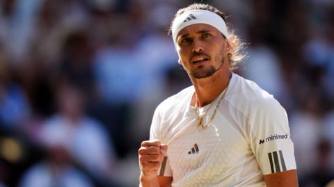Alexander Zverev celebrates with a clenched fist
