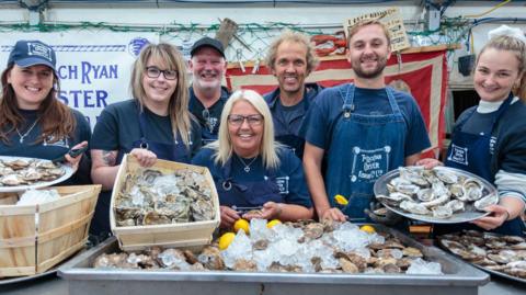 Participants at the Stranraer Oyster Festival showing off their shellfish