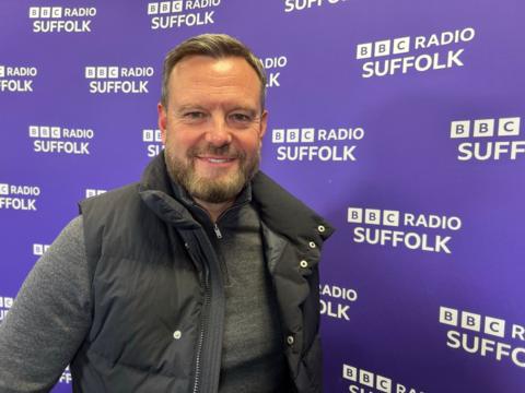 Mark Ashton smiles at the camera