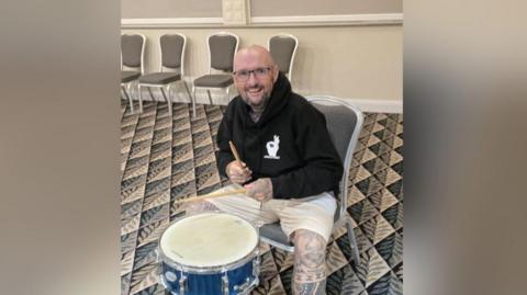 Lee Jobber on a drum