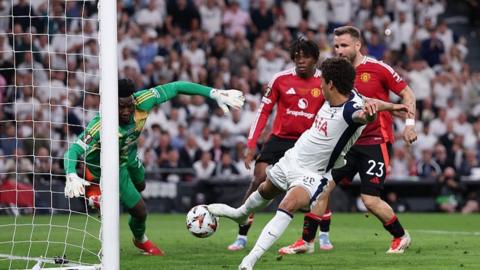 Tottenham's Brennan Johnson scores the decisive goal in his side's Europa League victory over Manchester United in Bilbao