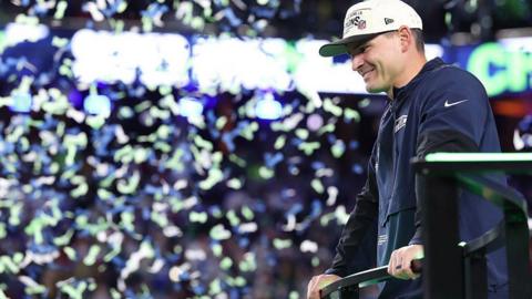 Seahawks coach Mike Macdonald is backed by ticker tape