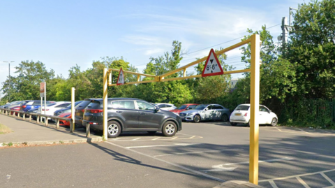 Burnham Lane surface car park is almost full with about 20 cars