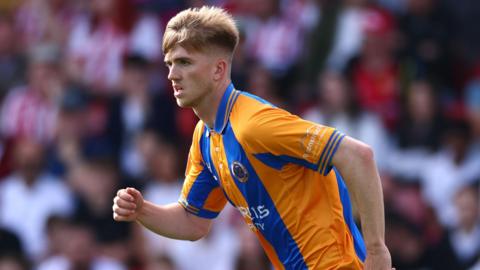 Josh Feeney spent a season on loan at Shrewsbury Town