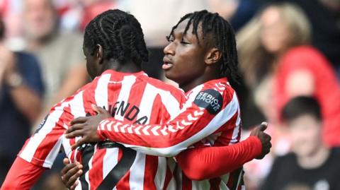 Romaine Mundle of Sunderland celebrates scoring their first goal