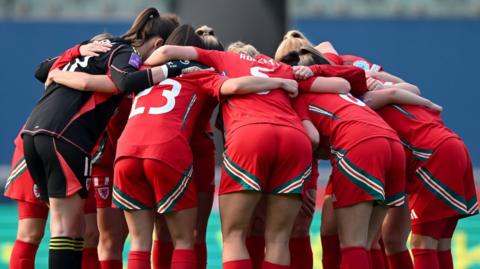 Wales players in huddle