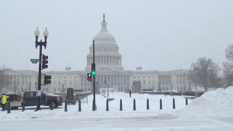 The Capitol building surrounded by snow