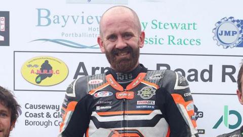 Jamie Coward on the podium at the Armoy road races