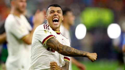 Pedro Porro celebrates after match