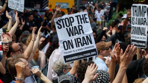 Demonstrators protest following U.S attack on Iran's nuclear sites and against Iran-Israel conflict.