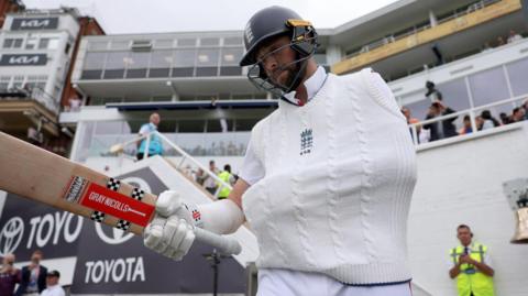 Chris Woakes coming out to bat for England