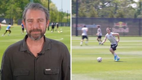 On the left, a man in a dark green shirt. On the right, a man in white shirt plays soccer.