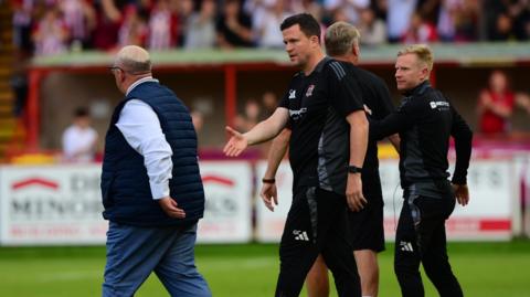 Rotherham manager Steve Evans and Exeter City boss Gary Caldwell