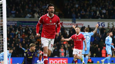 Kieffer Moore celebrates after scoring