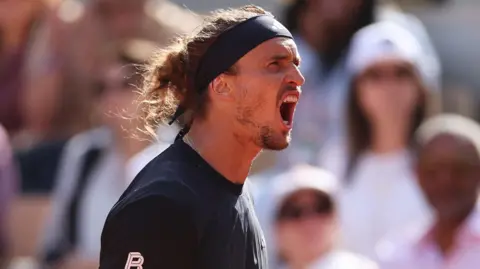 Alexander Zverev yells in celebration